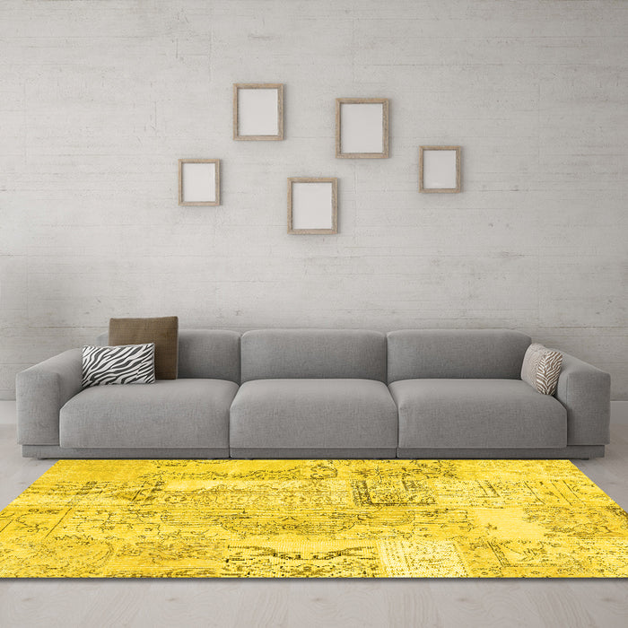 Machine Washable Patchwork Yellow Transitional Rug in a Living Room, wshcon2913yw