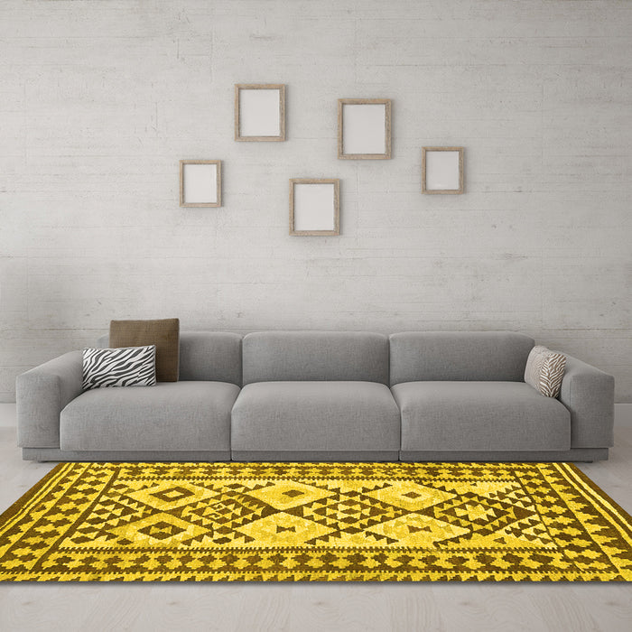 Machine Washable Southwestern Yellow Country Rug in a Living Room, wshcon2921yw
