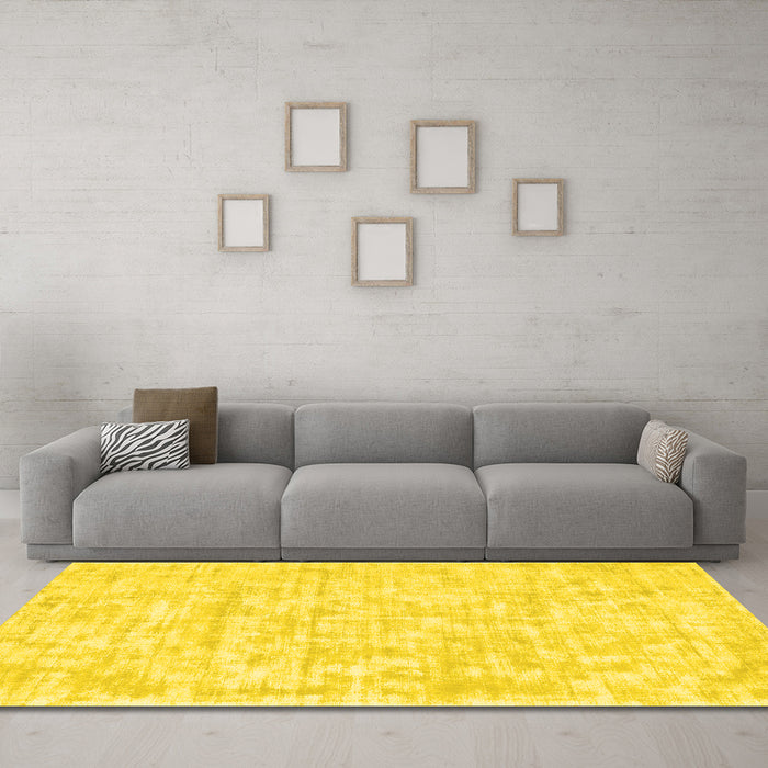 Machine Washable Solid Yellow Modern Rug in a Living Room, wshcon2945yw