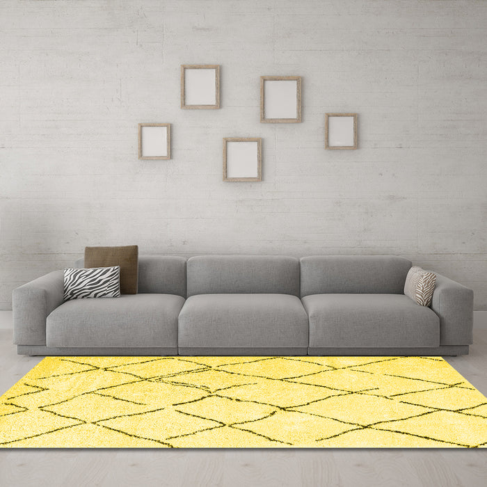 Machine Washable Solid Yellow Modern Rug in a Living Room, wshcon2986yw