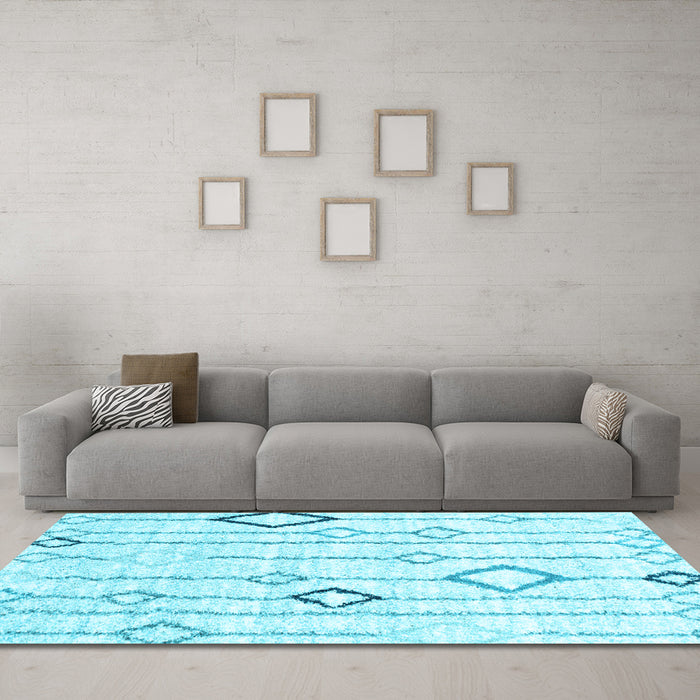 Machine Washable Solid Light Blue Modern Rug in a Living Room, wshcon3034lblu