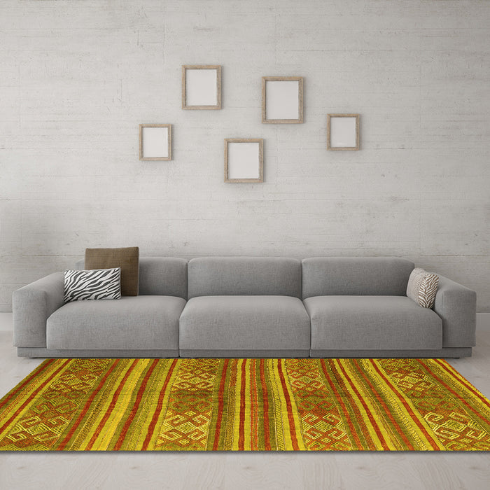 Machine Washable Southwestern Yellow Country Rug in a Living Room, wshcon3043yw