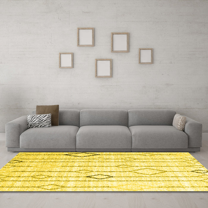 Machine Washable Solid Yellow Modern Rug in a Living Room, wshcon3067yw