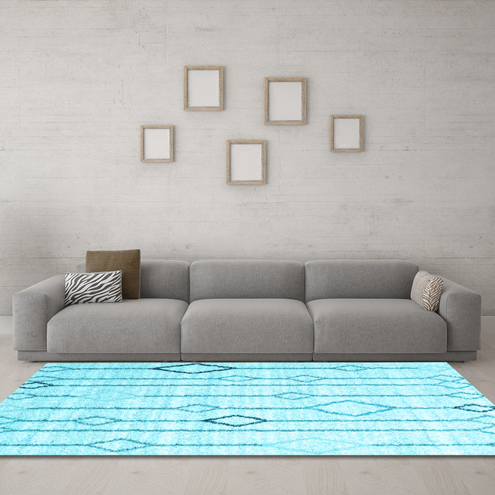 Machine Washable Solid Light Blue Modern Rug in a Living Room, wshcon3067lblu