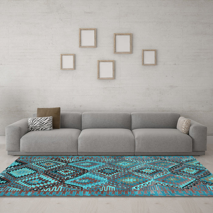 Machine Washable Oriental Light Blue Traditional Rug in a Living Room, wshcon3073lblu