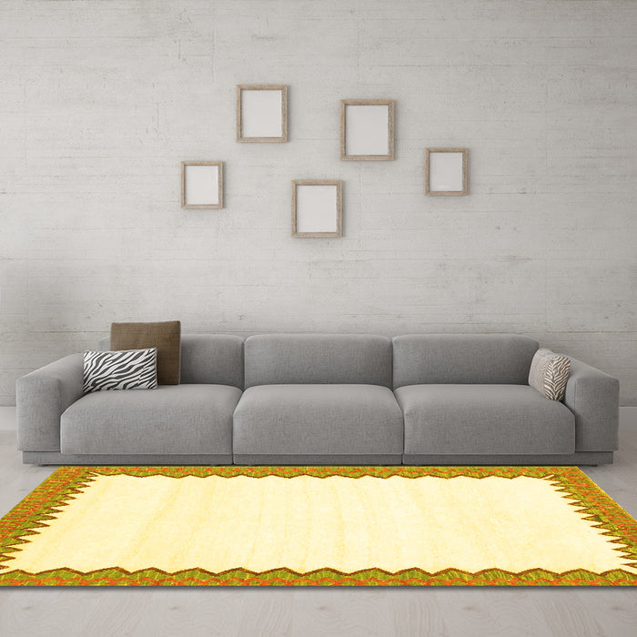 Machine Washable Solid Yellow Modern Rug in a Living Room, wshcon3083yw