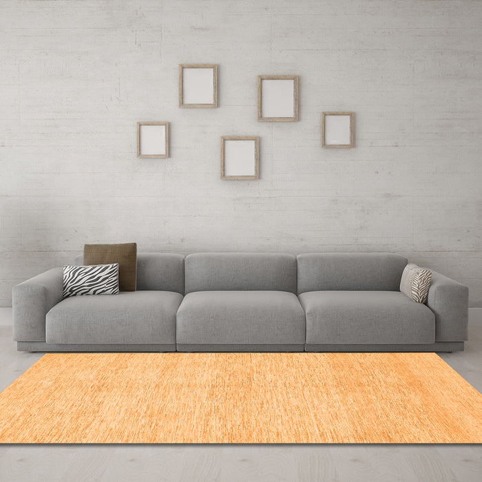 Machine Washable Solid Orange Modern Area Rugs in a Living Room, wshcon309org