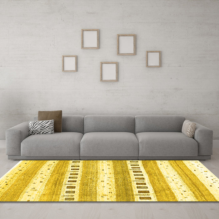 Machine Washable Solid Yellow Modern Rug in a Living Room, wshcon318yw
