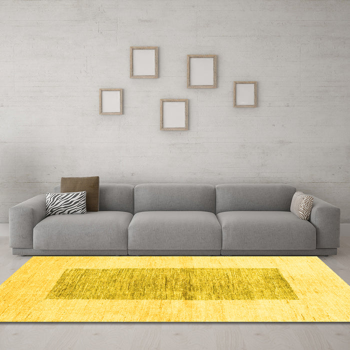 Machine Washable Solid Yellow Modern Rug in a Living Room, wshcon325yw