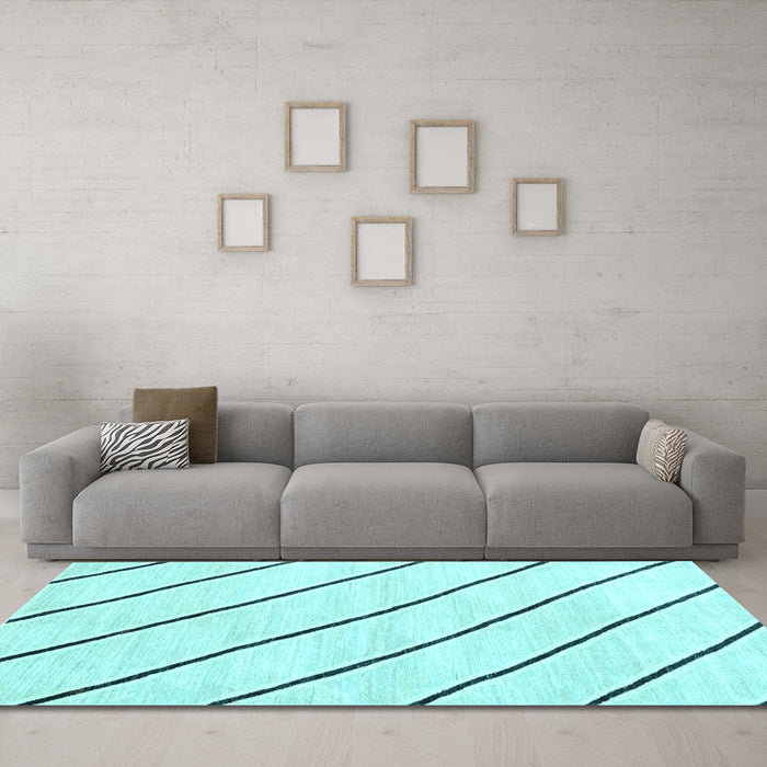 Machine Washable Solid Light Blue Modern Rug in a Living Room, wshcon327lblu