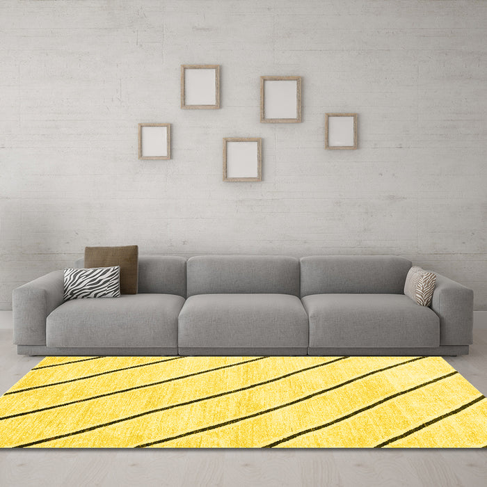 Machine Washable Solid Yellow Modern Rug in a Living Room, wshcon327yw