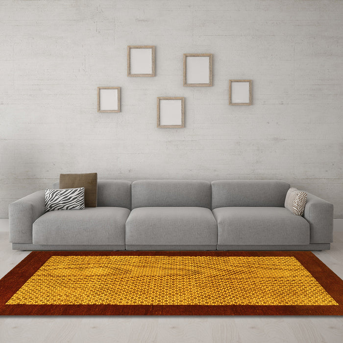 Machine Washable Abstract Yellow Contemporary Rug in a Living Room, wshcon364yw