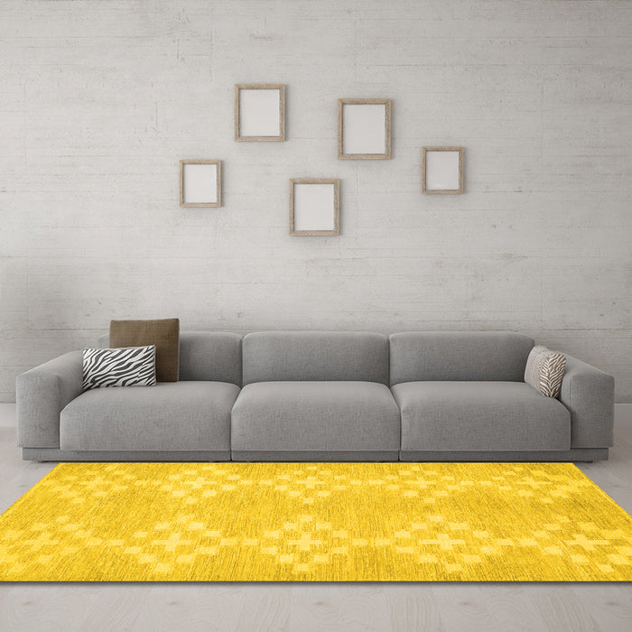 Machine Washable Solid Yellow Modern Rug in a Living Room, wshcon385yw