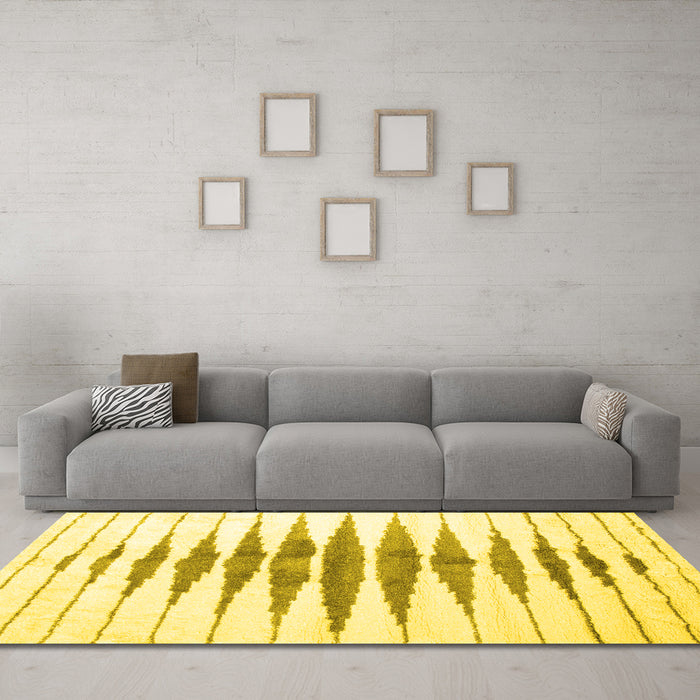 Machine Washable Solid Yellow Modern Rug in a Living Room, wshcon410yw
