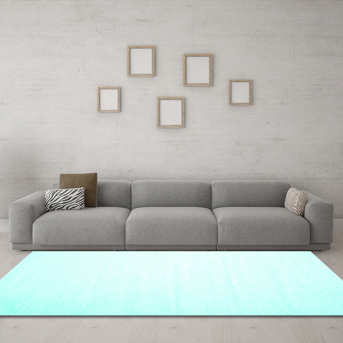 Machine Washable Solid Turquoise Modern Area Rugs in a Living Room,, wshcon414turq