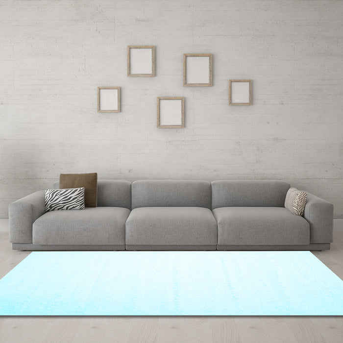 Machine Washable Solid Light Blue Modern Rug in a Living Room, wshcon414lblu