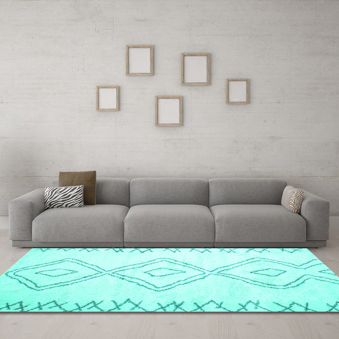 Machine Washable Solid Turquoise Modern Area Rugs in a Living Room,, wshcon416turq