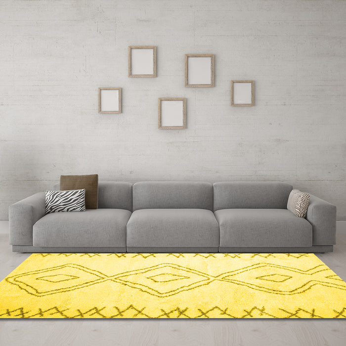 Machine Washable Solid Yellow Modern Rug in a Living Room, wshcon416yw