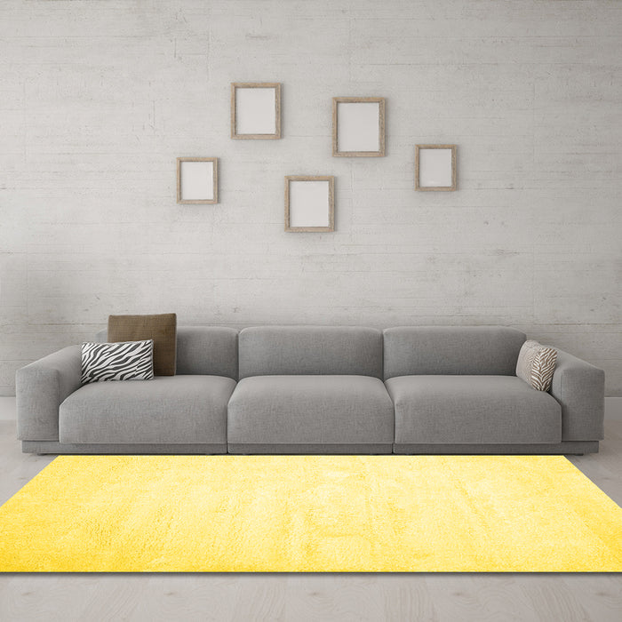 Machine Washable Solid Yellow Modern Rug in a Living Room, wshcon417yw