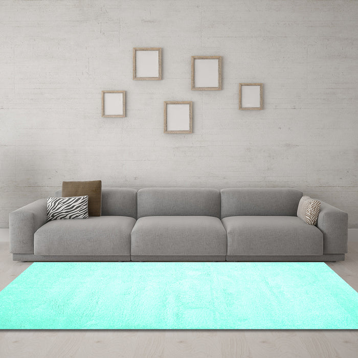 Machine Washable Solid Turquoise Modern Area Rugs in a Living Room,, wshcon417turq