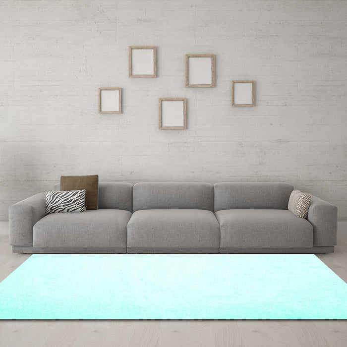 Machine Washable Solid Turquoise Modern Area Rugs in a Living Room,, wshcon422turq