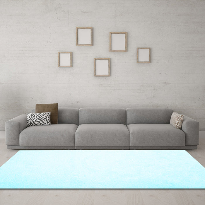 Machine Washable Solid Light Blue Modern Rug in a Living Room, wshcon422lblu