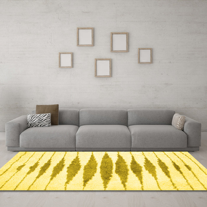 Machine Washable Solid Yellow Modern Rug in a Living Room, wshcon427yw