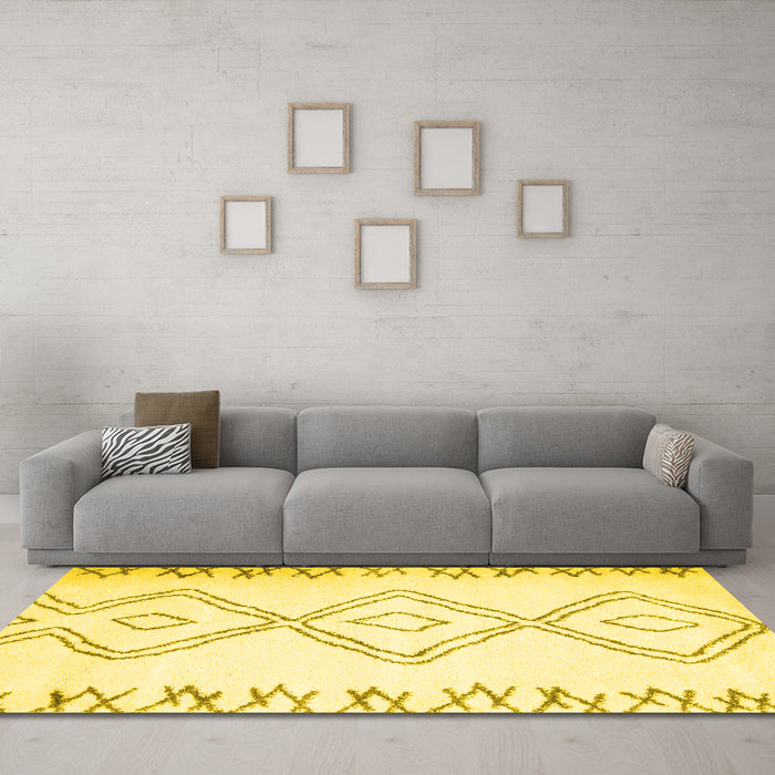 Machine Washable Solid Yellow Modern Rug in a Living Room, wshcon431yw