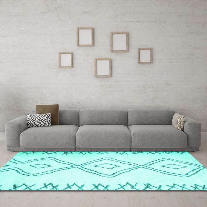 Machine Washable Solid Turquoise Modern Area Rugs in a Living Room,, wshcon431turq