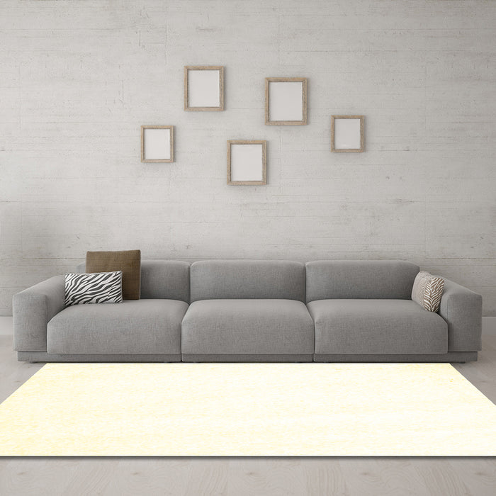 Machine Washable Solid Yellow Modern Rug in a Living Room, wshcon464yw