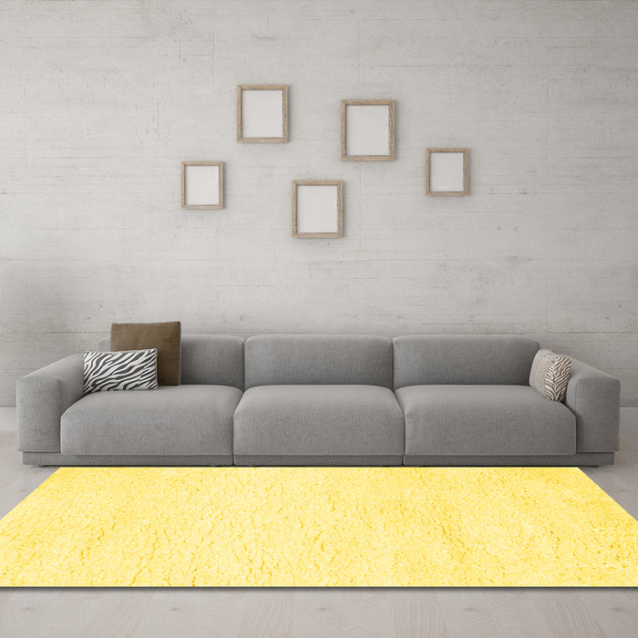 Machine Washable Solid Yellow Modern Rug in a Living Room, wshcon465yw
