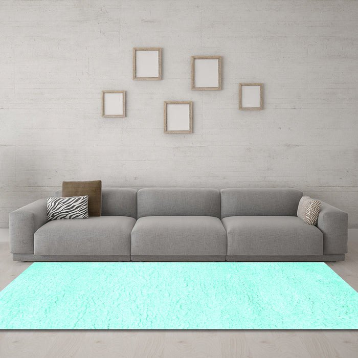 Machine Washable Solid Turquoise Modern Area Rugs in a Living Room,, wshcon465turq