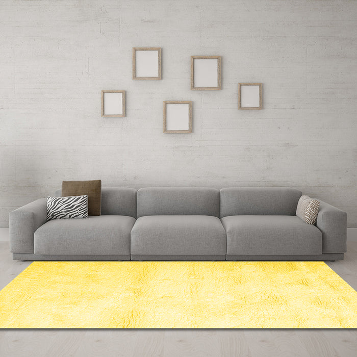Machine Washable Solid Yellow Modern Rug in a Living Room, wshcon466yw