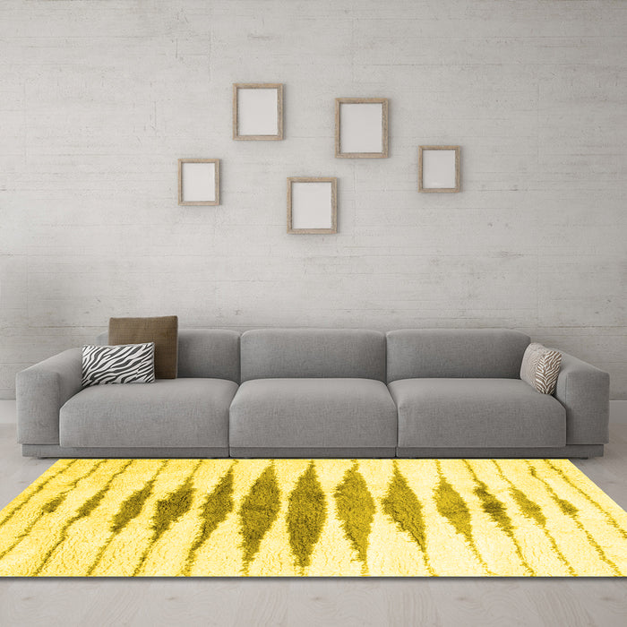Machine Washable Solid Yellow Modern Rug in a Living Room, wshcon467yw