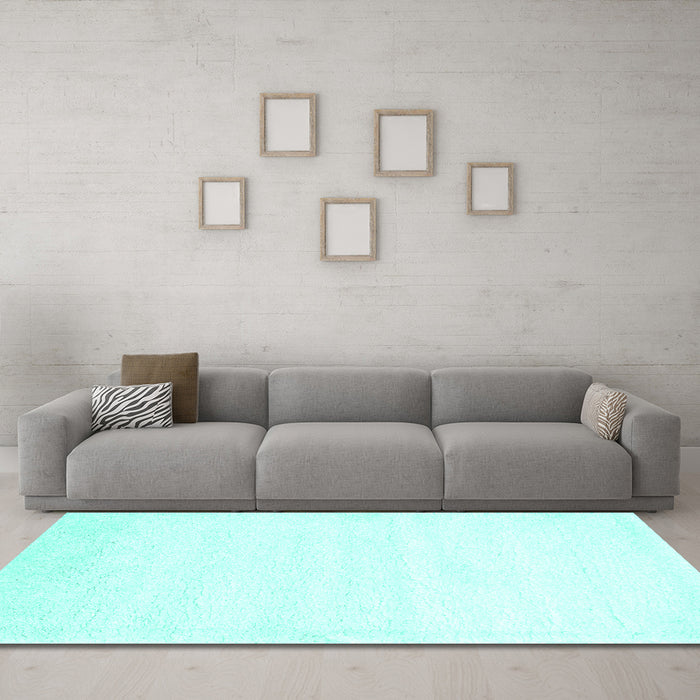 Machine Washable Solid Turquoise Modern Area Rugs in a Living Room,, wshcon476turq