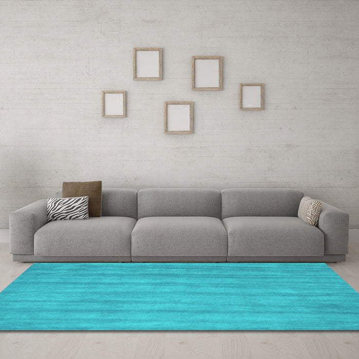Machine Washable Abstract Turquoise Contemporary Area Rugs in a Living Room,, wshcon4turq