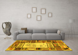 Machine Washable Patchwork Yellow Transitional Rug in a Living Room, wshcon501yw