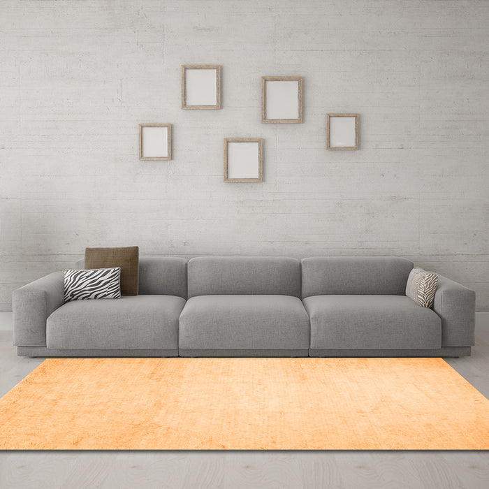 Machine Washable Solid Orange Modern Area Rugs in a Living Room, wshcon521org