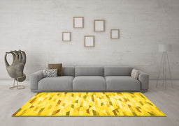 Machine Washable Solid Yellow Modern Rug in a Living Room, wshcon524yw