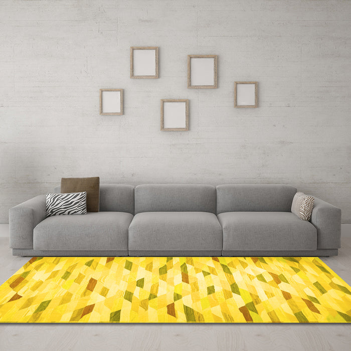 Machine Washable Solid Yellow Modern Rug in a Living Room, wshcon524yw
