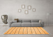 Machine Washable Solid Orange Modern Area Rugs in a Living Room, wshcon552org