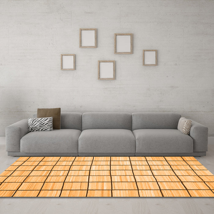 Machine Washable Solid Orange Modern Area Rugs in a Living Room, wshcon552org