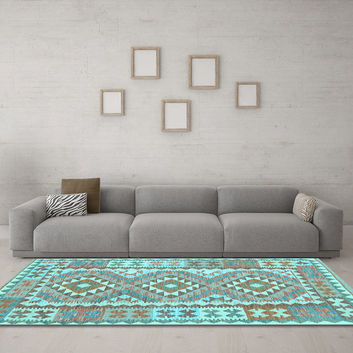 Machine Washable Oriental Light Blue Traditional Rug in a Living Room, wshcon553lblu