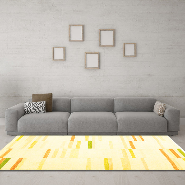 Machine Washable Solid Yellow Modern Rug in a Living Room, wshcon555yw