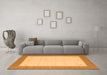 Machine Washable Solid Orange Modern Area Rugs in a Living Room, wshcon568org