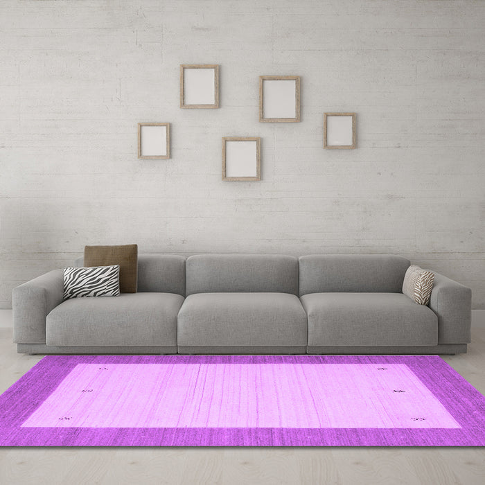 Machine Washable Solid Purple Modern Area Rugs in a Living Room, wshcon568pur