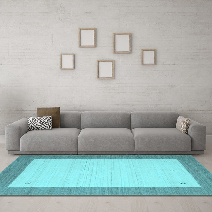 Machine Washable Solid Light Blue Modern Rug in a Living Room, wshcon568lblu