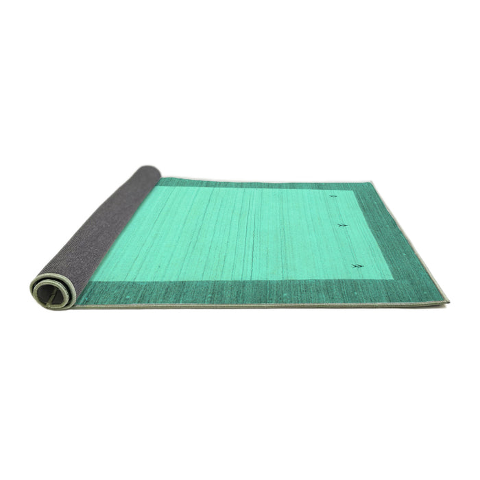 Sideview of Solid Turquoise Modern Rug, con569turq