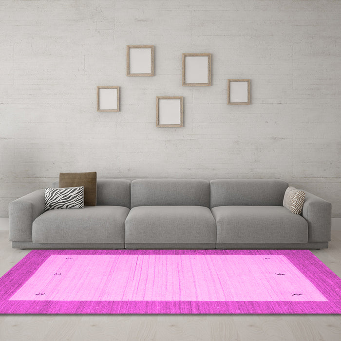 Machine Washable Solid Pink Modern Rug in a Living Room, wshcon569pnk
