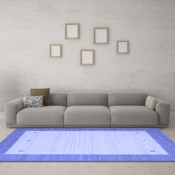Machine Washable Solid Blue Modern Rug in a Living Room, wshcon569blu